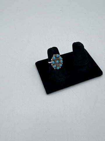Oval Turquoise Silver Ring with Small Circle Stones
